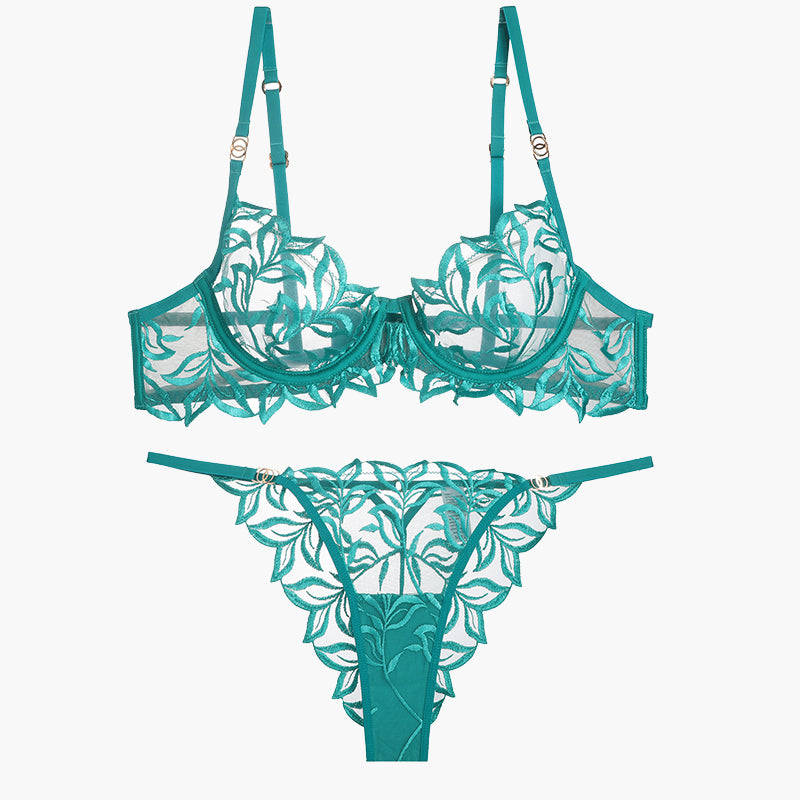 Teal embroidered lace bra and panty set. Delicate floral design, adjustable straps, and see-through.