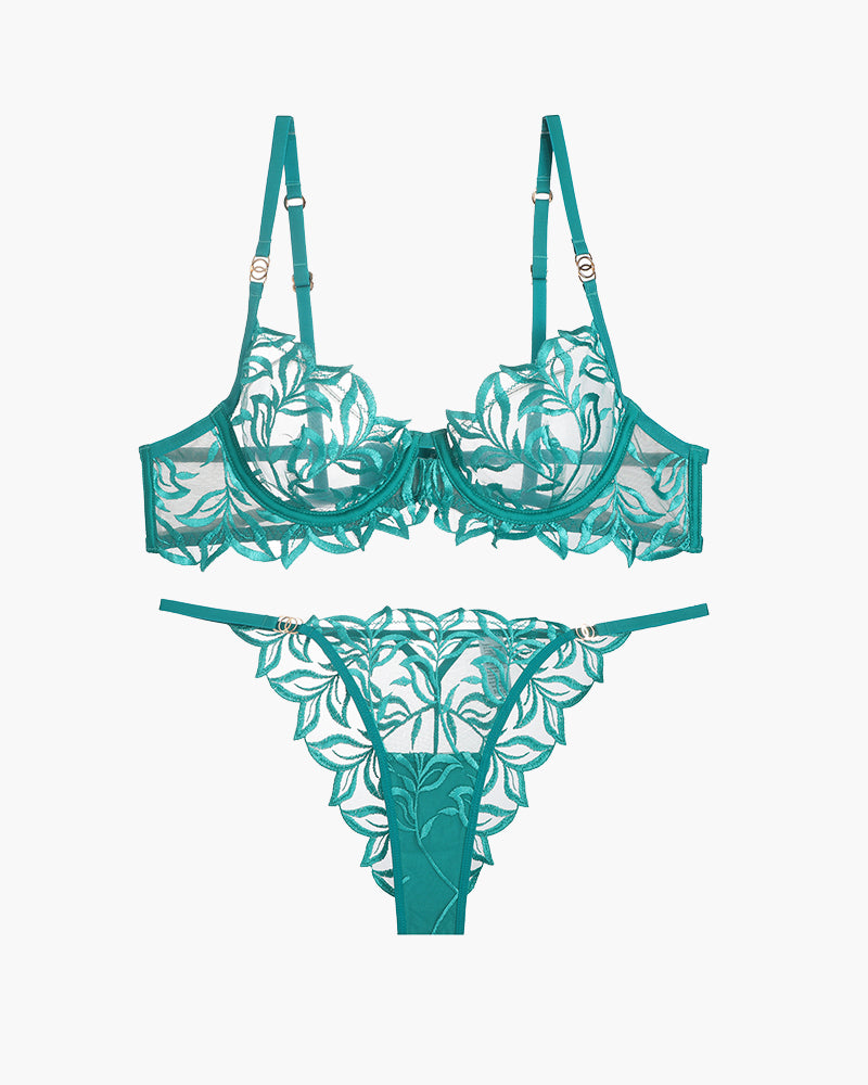 Teal embroidered lace bra and panty set. Delicate floral design, adjustable straps, and see-through.
