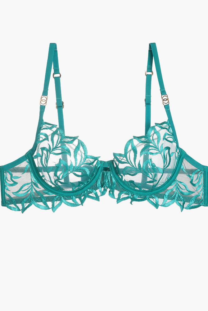 Embroidered lace bra in teal with floral design, adjustable straps, and underwire.
