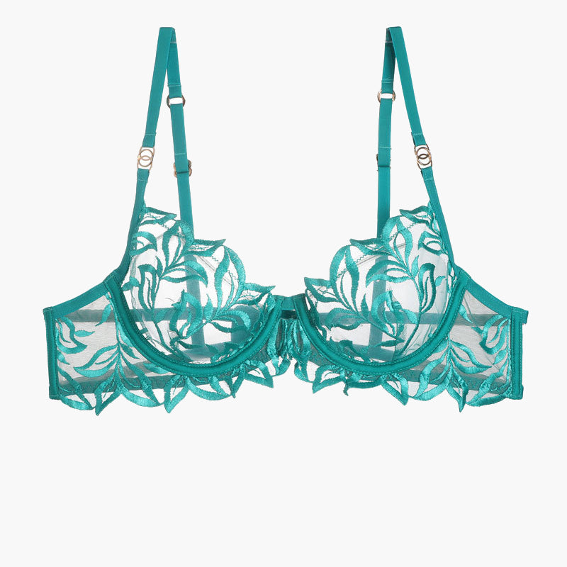Embroidered lace bra in teal with floral design, adjustable straps, and underwire.