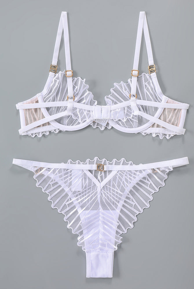 White embroidered lingerie set. Adjustable straps, underwire bra, delicate lace details.