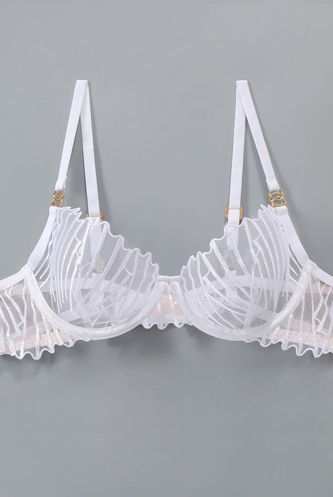 Delicate white embroidered bra with adjustable straps and lace details; sweet yet seductive.