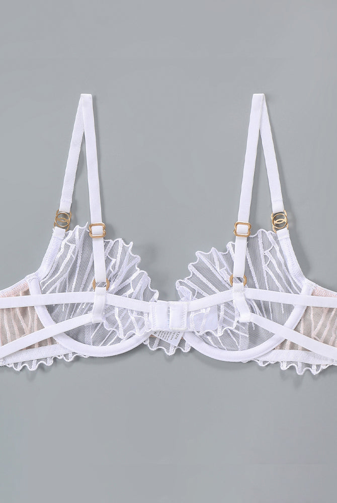 White embroidered bra with adjustable straps and delicate lace details; sweet yet seductive.