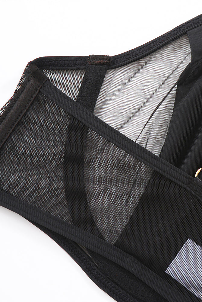 Black mesh push-up bra detail. Seductive lingerie with adjustable straps and underwire.