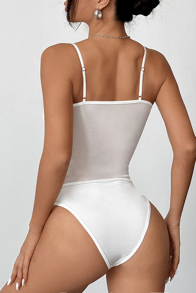 White mesh bodysuit with spaghetti straps and delicate lace trim. Perfect for special events.