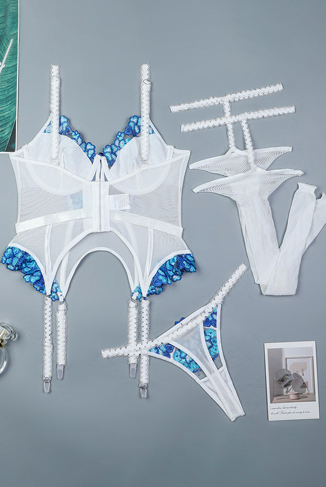 Embroidered white and blue corset set with fishnet stockings and adjustable straps