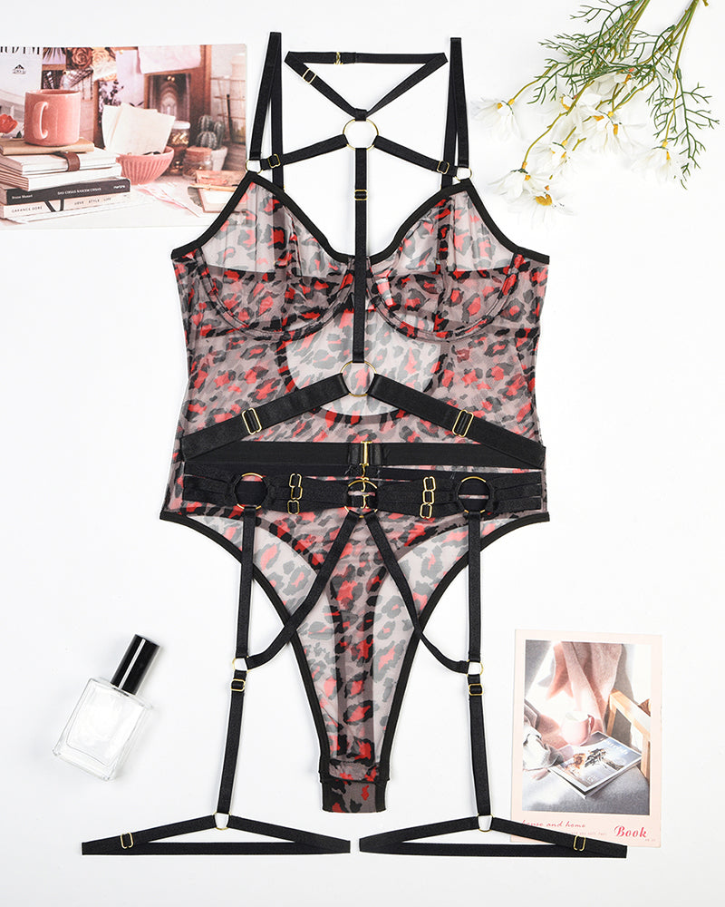 Leopard print mesh bodysuit with red leopard pattern, black straps, and steel rings