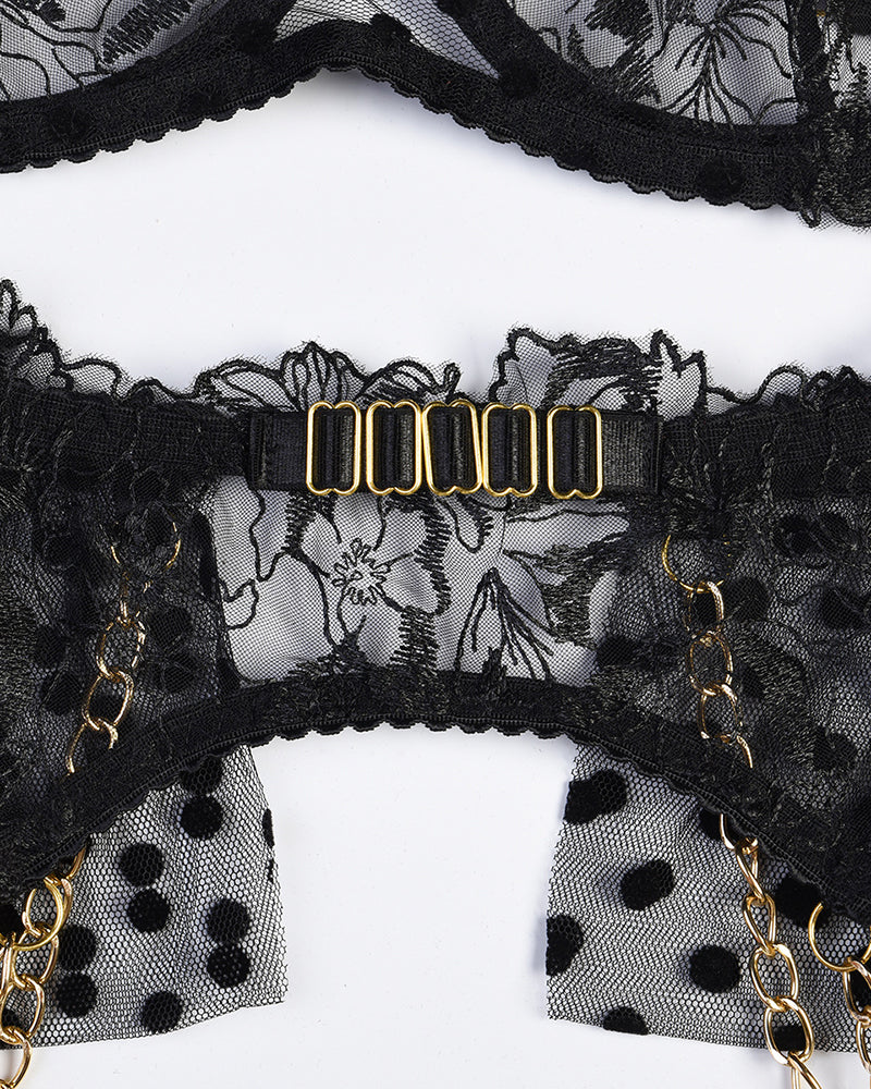 Black embroidered lace lingerie set with gold chain accents and adjustable straps