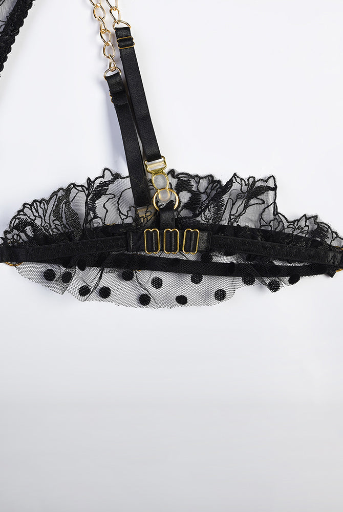 Black lace lingerie set with floral embroidery, gold chain, adjustable straps. Sexy lingerie.