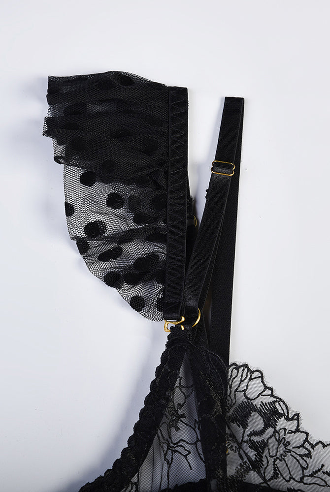 Black floral lace lingerie set with polka dot mesh detail, adjustable straps and gold accents