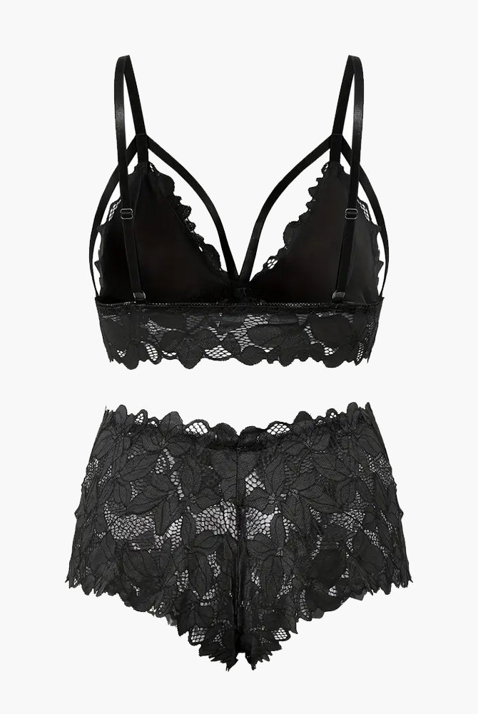 Black plus size lace bra and boy short set with floral appliques and strappy details