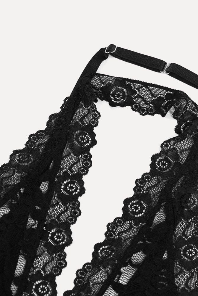 Black lace plunge neck halter top with intricate floral lace detailing and adjustable straps.