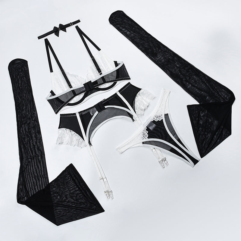 Black and white lace lingerie set with choker, push-up bra, garter belt, and stockings.