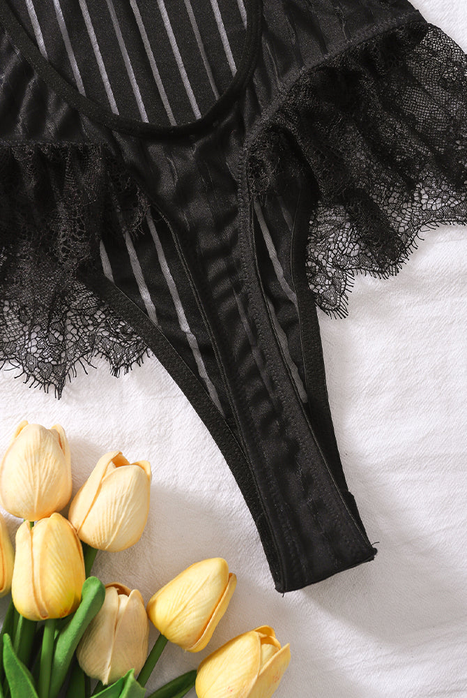 Black lace bodysuit with eyelash lace trim, vertical stripes and yellow tulips.
