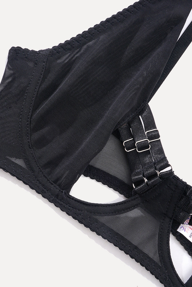 Black open-bust lingerie top with sheer fabric and metal details. Sensual and elegant design.