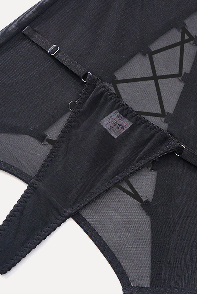 Black sheer lingerie set with thong and top. Sensual design with metal details.