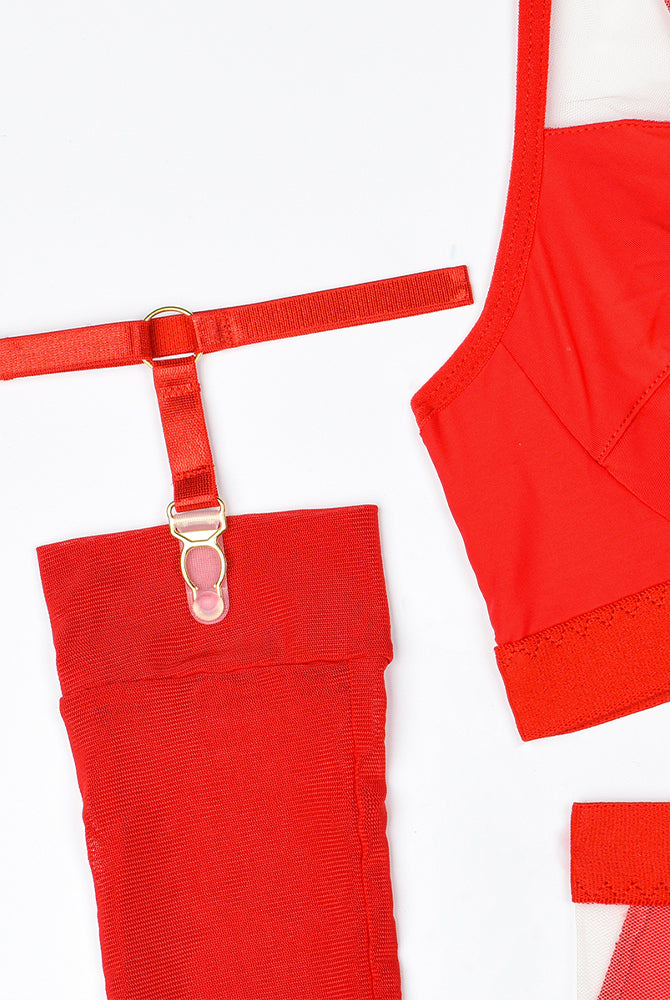 Red bra with elastic straps and adjustable garter straps with metal rings