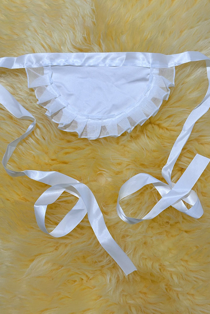 White sheer lace thong-style panties with ruffle trim