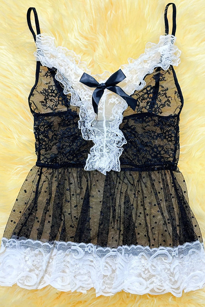 Maid costume dress set with black lace corset, white ruffled skirt, and satin bow