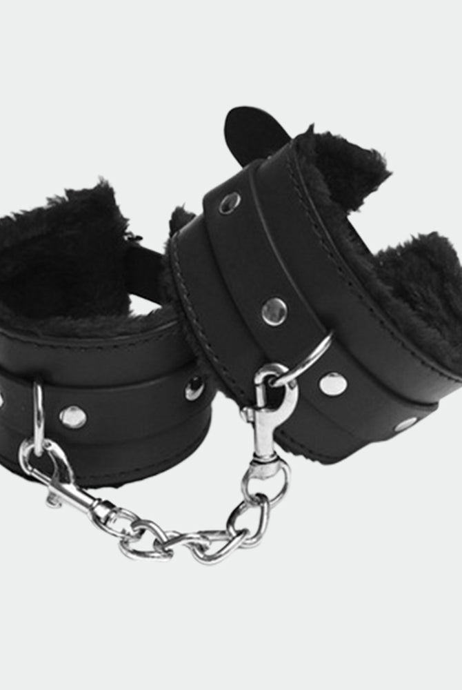 Black plush leather handcuffs with silver chain, perfect for role play and intimate moments.