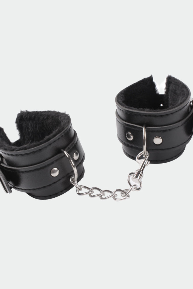 Black plush leather handcuffs with silver chain for role play and intimate moments