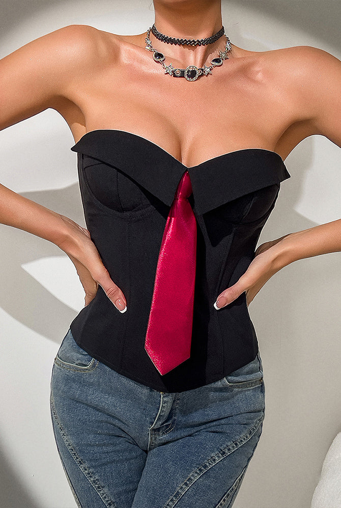 Strapless black corset top with red tie detail, steel boning, and bust support