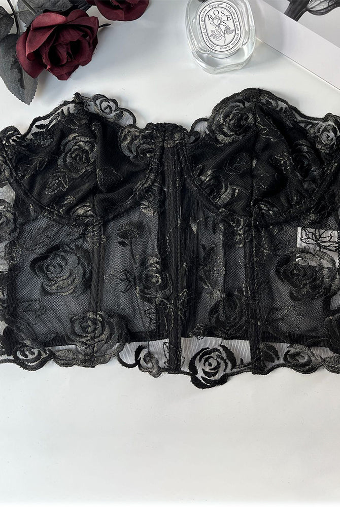 Black floral strapless mesh bustier with boning. Offers elegance and support. Rose embroidery.