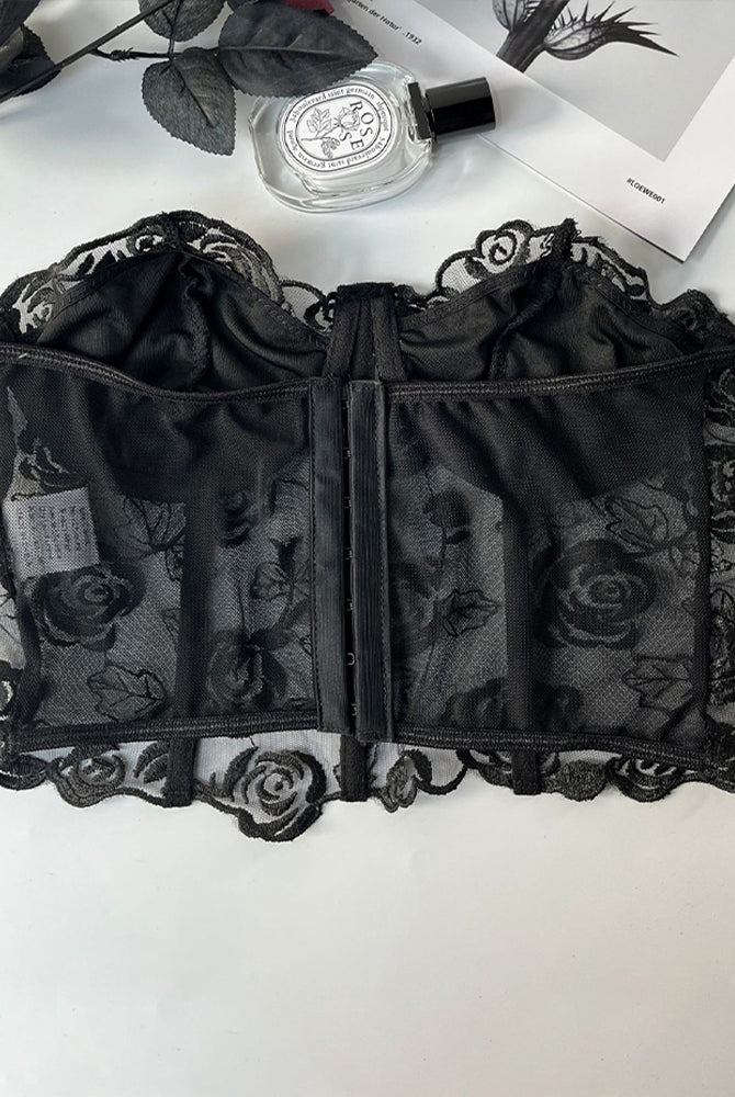 Black floral strapless mesh bustier with boning and rose embroidery, offering elegant support.