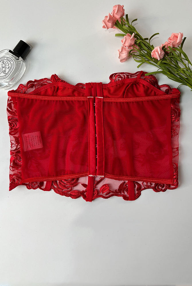 Red strapless mesh bustier with rose embroidery, offering elegant support and waist shaping.
