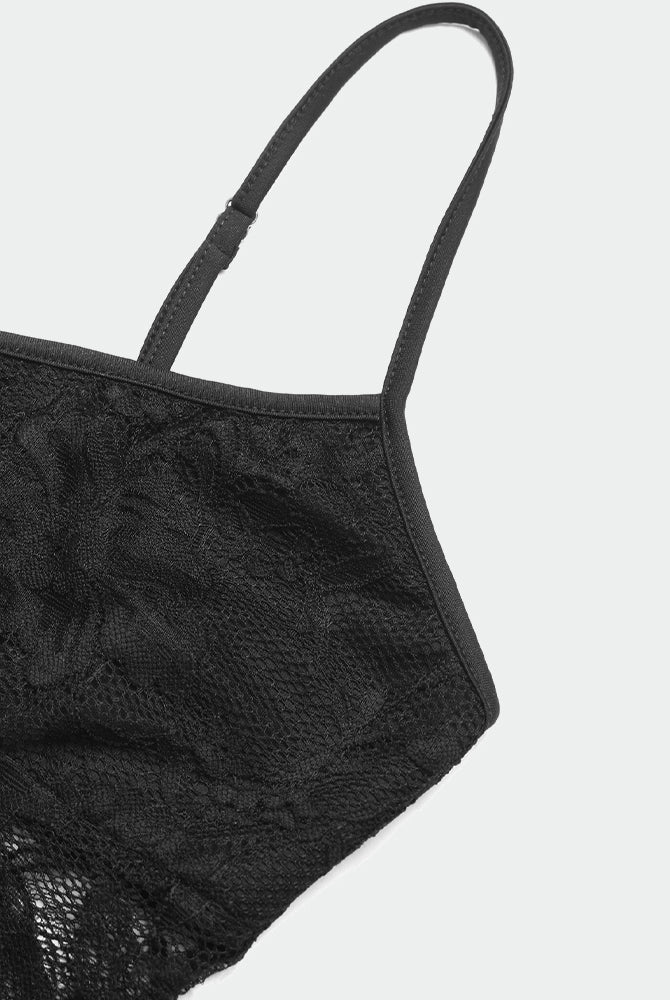 Black lace crop top camisole with spaghetti straps and semi-sheer design