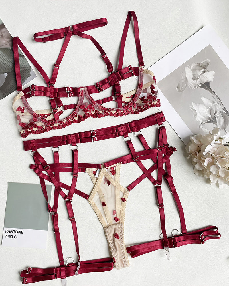 Burgundy strappy lingerie set with heart details for a romantic night. Underwire and embroidery.
