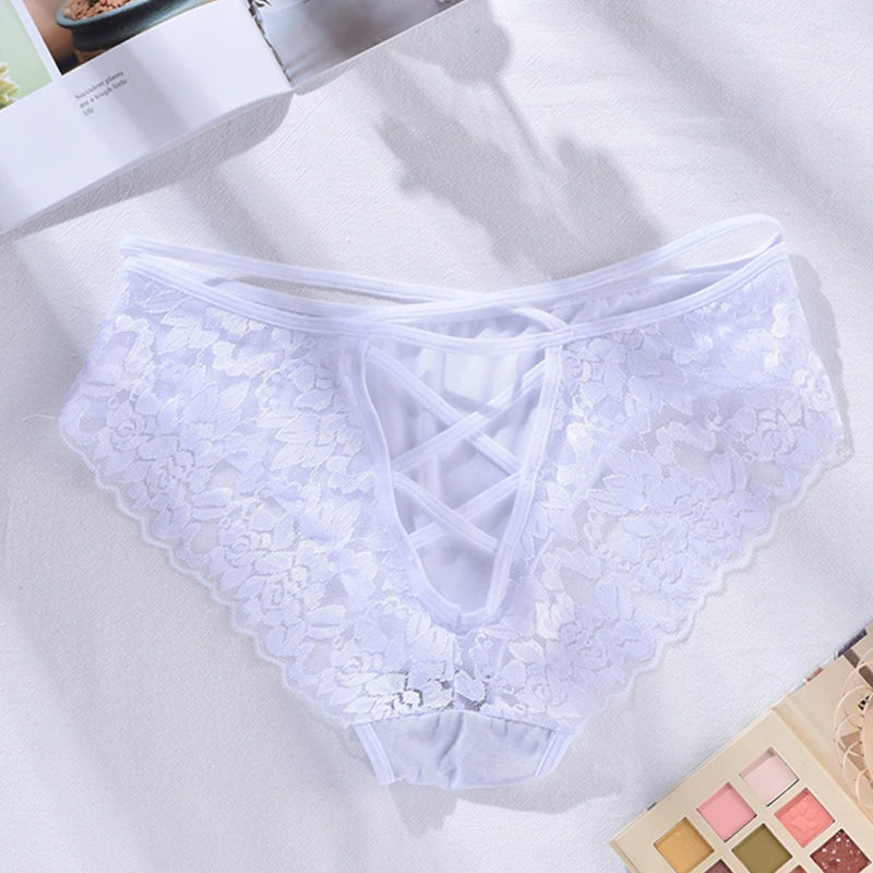 White plus size lace triangle panties with cut-out design and criss-cross detail, floral lace