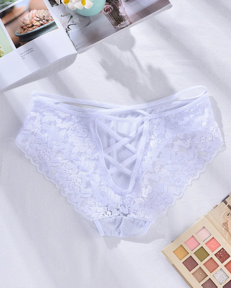 White plus size lace triangle panties with cut-out design and criss-cross detail, floral lace
