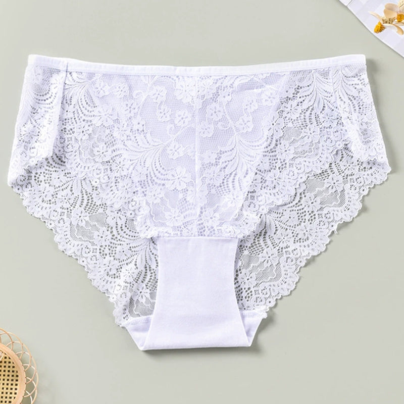 White lace briefs. Low rise, sheer lace sides. Sexy and comfortable lingerie. Floral lace design.