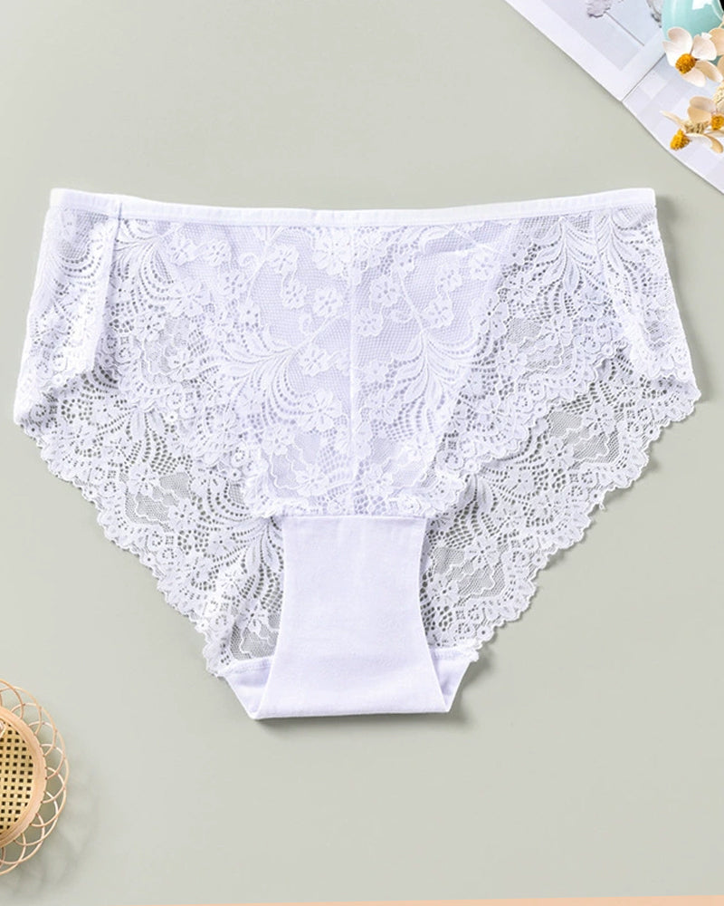 White lace briefs. Low rise, sheer lace sides. Sexy and comfortable lingerie. Floral lace design.