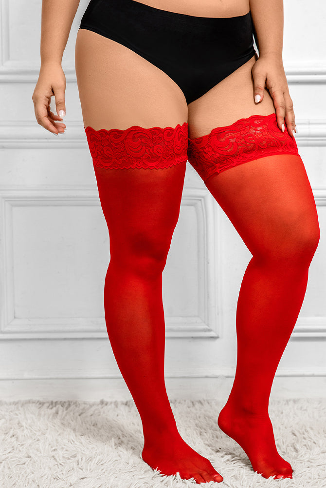Plus size red sheer thigh-high stockings with lace trim, perfect for a sensual look.