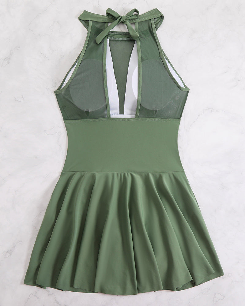Olive green plus size halter neck swim dress with mesh detail and flared skirt