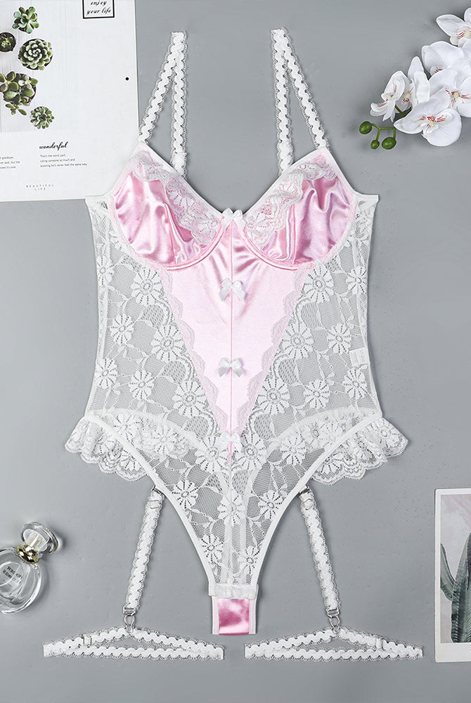 Pink lace mesh bodysuit with garter straps, half-cup bra design, and bow details.