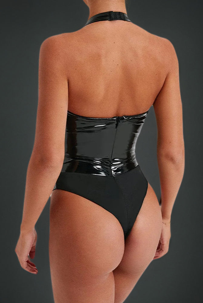 Black leather halter bodysuit back view with slim straps and high-cut leg, glossy finish