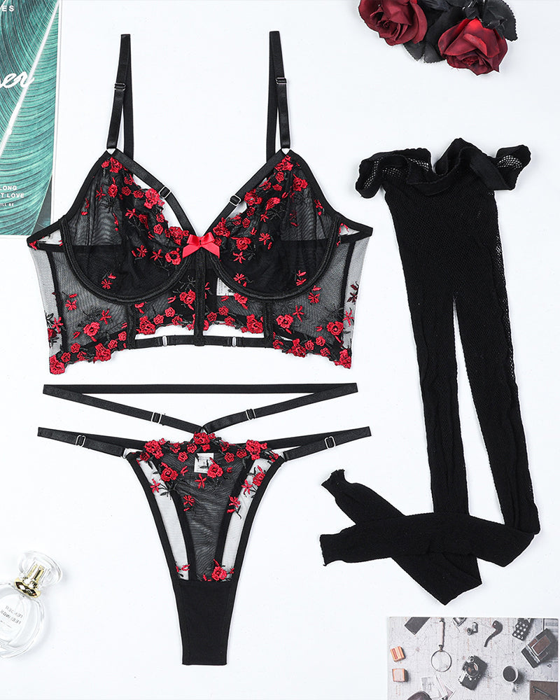 Embroidered floral lingerie set with black bra, thong, and stockings