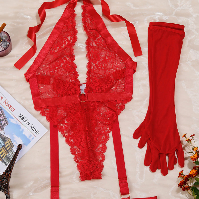Red lace halter bodysuit with garter straps and matching long gloves, flat lay