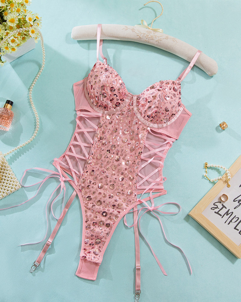 Pink sequin mesh erotic butterfly bodysuit with lace-up details, adjustable straps.
