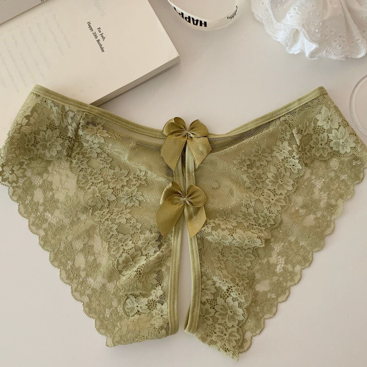 Olive sheer floral lace panties with scalloped edges and tied back bow detail