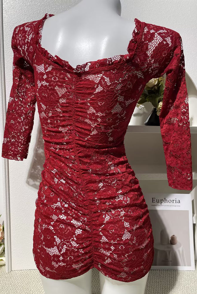 Red off-shoulder lace mini dress, ruched back view, long sleeves, fitted bodycon.