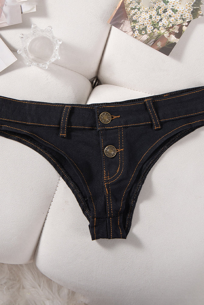Denim thong low-rise panties in black, flat lay with two gold buttons