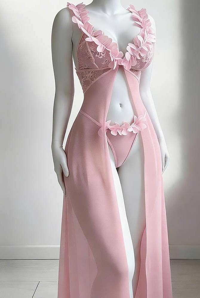 Pink sheer lace maxi skirt and thong set with scalloped floral applique on mannequin