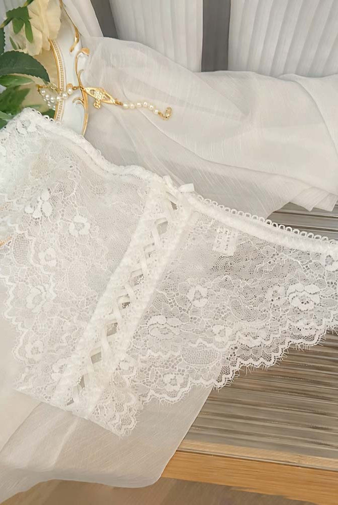 White lace panties with lace-up crisscross center panel and scalloped trim