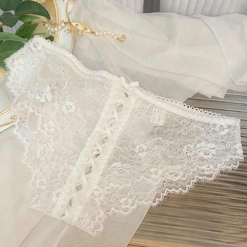 White lace panties with lace-up crisscross center panel and scalloped trim
