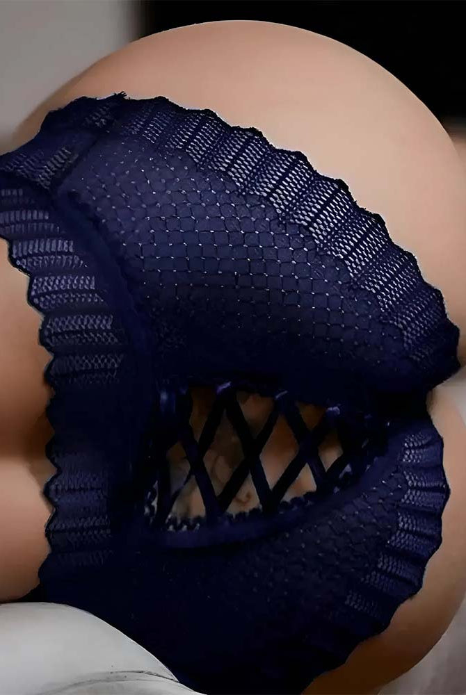 Navy blue lace crisscross panties with scalloped edges and crisscross cutout