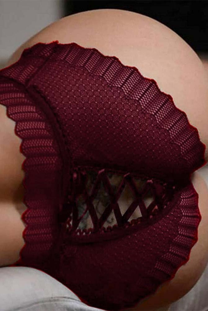 Red lace crisscross panties with scalloped edges and crisscross cutout